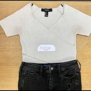 Cream cross strapped crop